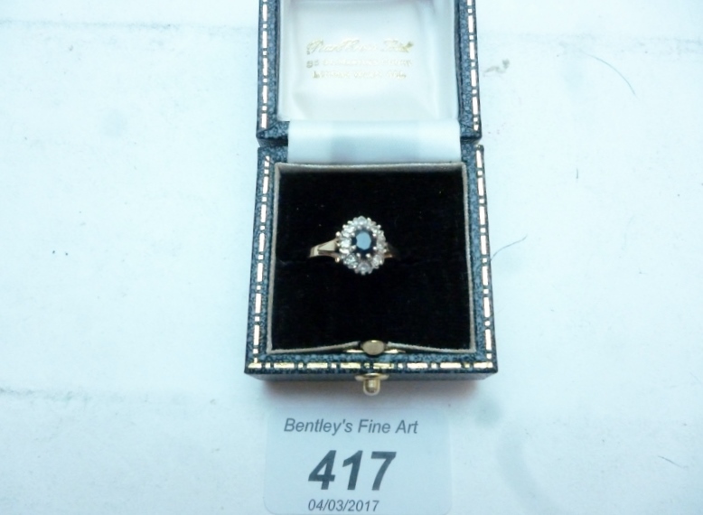A 9ct gold sapphire and diamond ring (size M) boxed est: £40-£60