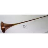 A copper and brass hunting horn est: £15-£40 (N wall)