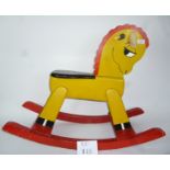 A small painted rocking horse est: £15-£25 (BB29)