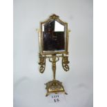 A Continental brass table mirror with twin sconces and caryatid figural support est: £30-£50 (A2)