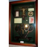 Tennis interest: a glazed case titled 'The History of Tennis' containing replica tennis related