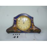 An 8 day mantle clock with Japan blue lacquered case (a/f) est: £25-£45 (G2)