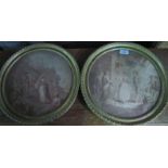 A pair of round gilt framed and glazed prints depicting figures resting/conversing in garden scene