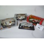 Four Burango model die cast cars to include a Bugatti Atlantic and Mercedez Benz est: £30-£50 (B24)