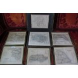 A box containing seven various framed and glazed maps to include four Yorkhire, Norfolk,