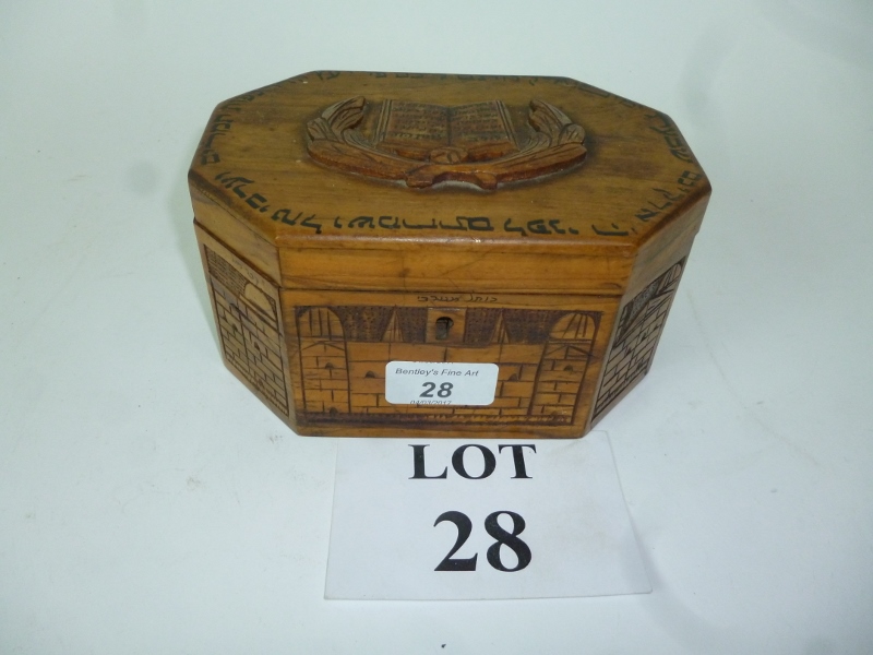 A carved olive wood caddy from The Holy Land est: £20-£40 (A2)
