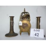 A lantern clock and a pair of brass candlesticks est: £30-£50 (B1)