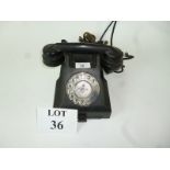 A vintage Bakelite telephone est: £20-£40 (A2)