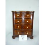 A small serpentine fronted and inlaid apprentice chest est: £160-£180 (AB8)