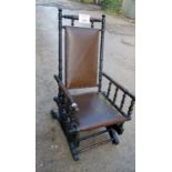 A c1900 rocking chair with turned supports est: £50-£80