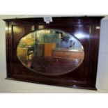 A c1900 mahogany framed wall mirror with oval centre glass est: £100-£130