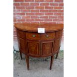 A 19c French inlaid demi lune side cabinet with centre drawer and cupboards est: £800-£1,