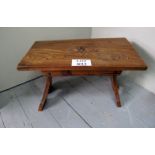 A Victorian pine side table with ornate