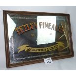 A large decorative advertising mirror fo