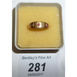 A 15ct gold ruby and diamond ring (size