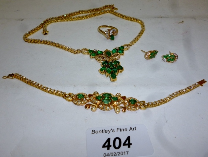 A fine 18ct yellow gold emerald and diam