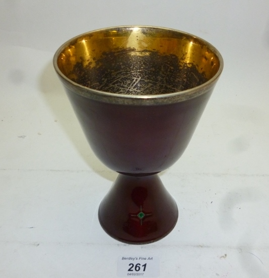 A red enamelled goblet inset with two em