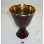 A red enamelled goblet inset with two em