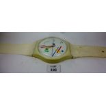 A Swatch Watch wall clock styled as a wa