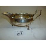 A silver sauce boat with acanthus leaf d