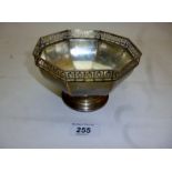 An octagonal silver pedestal dish with G