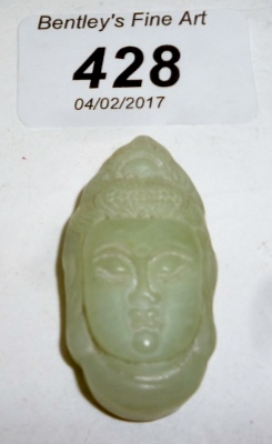 A jade carved pendant of the Goddess Gua