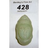 A jade carved pendant of the Goddess Gua