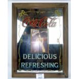 A large decorative framed advertising mi