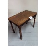A c1900 oak low lamp table with spiral t
