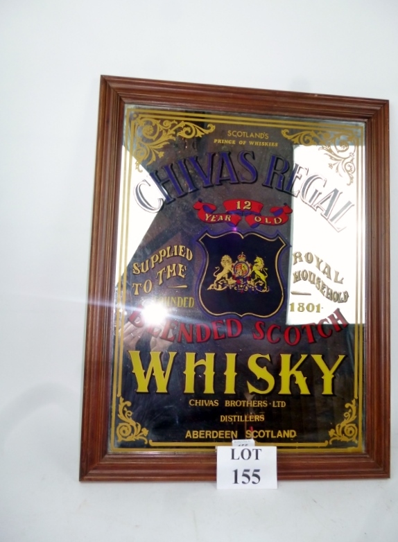 A decorative framed advertising mirror f