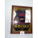 A decorative framed advertising mirror f