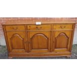 A large pine sideboard with drawers over