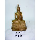 A metal Buddha seated on a lotus est: £3