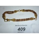 A 9ct gold bracelet inset with six diamo