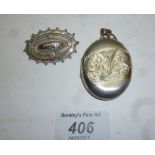 A Queen's Jubilee silver engraved locket