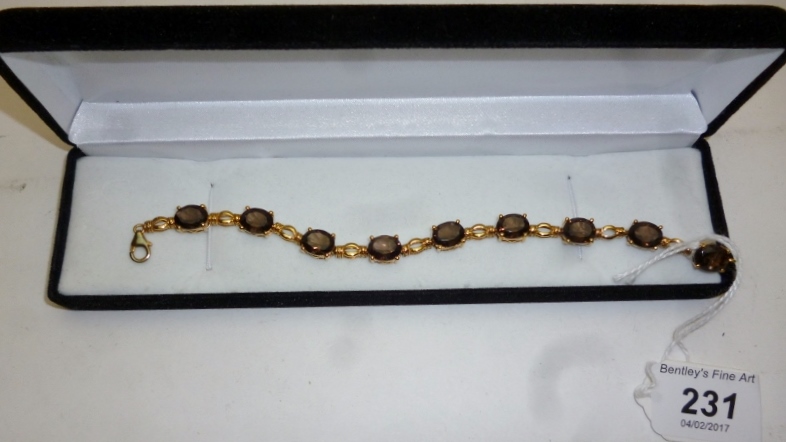 Smoky quartz bracelet (7.5" long) gold o