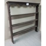 An 18c oak open wall shelf unit est: £80