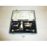 A silver condiment set Birmingham 1990 & 1991 Harrod's box est: £60-£90