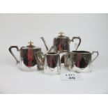 A four piece plated tea set with engraved decoration est: £30-£50 (D1)