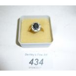 A 9ct gold sapphire and diamond ring (size M) est: £100-£150