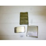 A silver cigarette case,