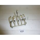 A silver toast rack Sheffield 1911 est: £30-£50