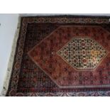A mid 20c Bidjar rug (168 x 110 cm approx) est: £100-£150