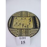 A large African soapstone dish or charger depicting dancers and musicians est: £10-£20 (A2)