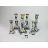 A pair of decorative French pottery Faience candlesticks,