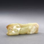 A Chinese yellow jade tiger est: £2,000-£3,