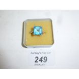 An 18ct white gold square set topaz with diamond shoulders (size M) est: £150-£250