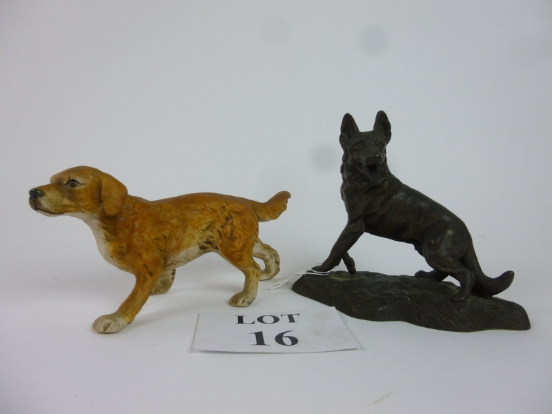 A ceramic dog figurine modelled as a golden retriever and another Alsatian dog figurine (2) est: