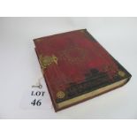 A 19th century Continental red leather and gilt tooled faux book box with gilt metal mount and lock