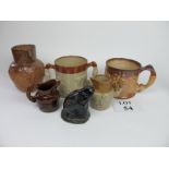 A collection of stoneware to include a large harvest-ware tyg;